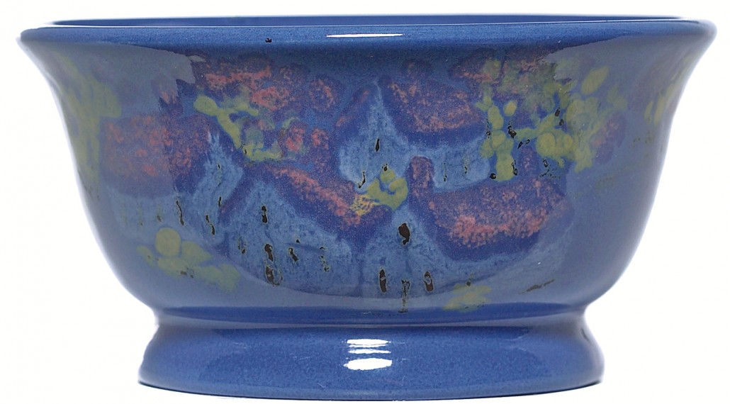An abstract landscape of houses is the subject matter on this unusual bowl. Measuring 5 inches in diameter, the bowl has the impressed OBK mark on the bottom. Image courtesy Treadway Toomey.