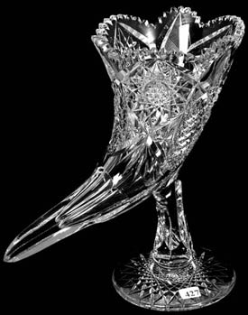 Glass pedestal cornucopia vase, 12” x 12”, with solid stem and Hobstar base, very rare ($8,500).