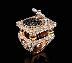 Missy Elliot’s black diamond and gold turntable ring; estimate: $6,500-8,500 Image courtesy Phillips de Pury & Company.