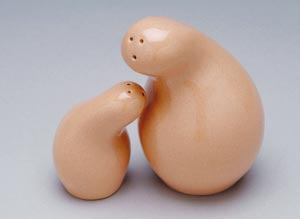 This salt and pepper shaker set of glazed earthenware, produced in 1999 for The Orange Chicken, is after Eva Zeisel’s 1945 Town and Country design of 1945. Image courtesy of Erie Art Museum.