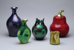 Eva Zeisel designed these porcelain vases with iridescent glaze for Zsolnay. They were produced in 1999. Image courtesy of Erie Art Museum.