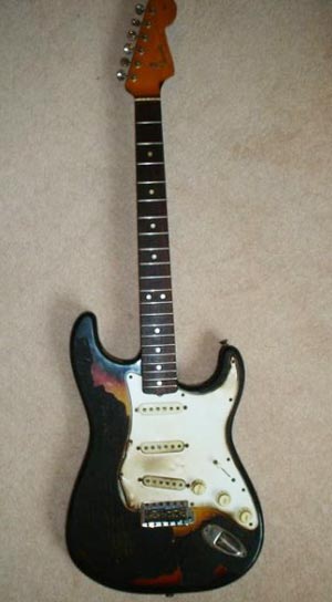 Fender Stratocaster, first guitar burned onstage by Jimi Hendrix, March 31, 1967 - $497,557. Image courtesy Fame Bureau.