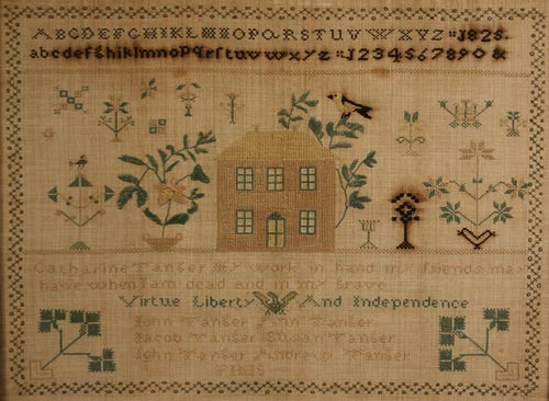 1826 Lancaster County, Pa., sampler features eagle and patriotic inscription. 