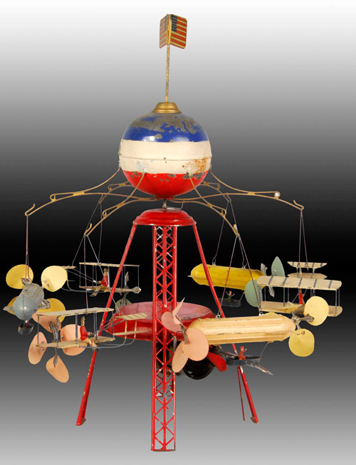 M&K German hand-painted tin clockwork toy featuring three zeppelins and three biplanes - $13,800.