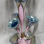 One of two made, an 18½-inch-tall artist’s proof of a pulled-feather luster epergne hand blown by master glass artist Richard Golding of Okra Studios, Stourbridge, England.