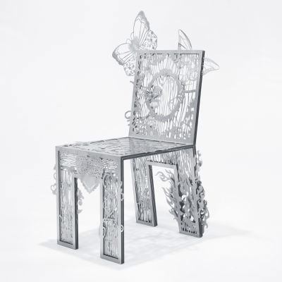 Tjep. Chair of Textures Droog The Netherlands, 2005 laser cut stainless steel, acrylic 28 w x 20 d x 41 h inches Estimate: $18,000–22,000