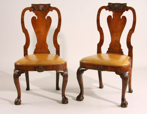 Period furniture at Leland Little's auction included these English George II walnut side chairs. The pair brought $9,200. 