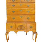 A Queen Anne figured maple fan carved flat-top highboy circa 1776 from Massachusetts. Image courtesy Gray's Auctioneers.