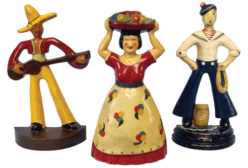 More than 100 figural cast-iron doorstops will be auctioned at Bertoia’s including three rare examples by Littco: Guitar Player, Tropical Woman with Fruit Basket, and Sailor. Image courtesy Bertoia Auctions.