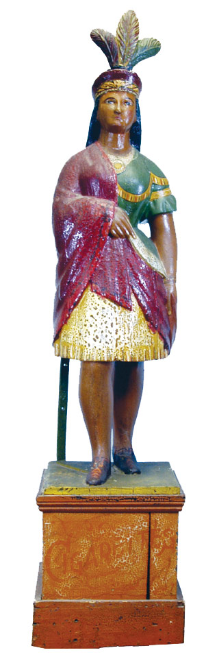 Made of hand-carved, hand-painted wood, this cigar store Indian maiden stands 6 feet tall and exhibits beautiful patination. Image courtesy Bertoia Auctions.