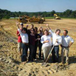 Leland Little, second from left, and his staff celebrated breaking round for the new home of Leland Little Auctions & Estate Sales Ltd. in Hillsborough, N.C., in September.