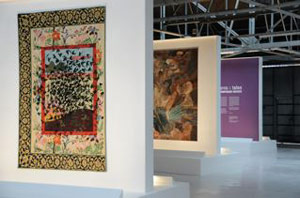 Interior view of London gallery The Dairy, showing the current Banners of Persuasion exhibition of tapestries designed by leading contemporary artists, including Grayson Perry, Gavin Turk, Gary Hume and Kara Walker. Image courtesy Banners of Persuasion.