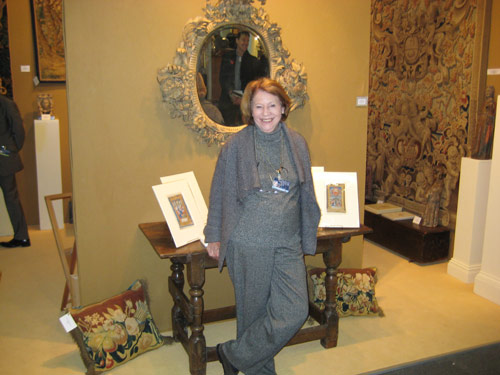 London-based specialist textiles and sculpture dealer Joanna Booth on her stand at the Winter Olympia Fine Art & Antiques Fair. Photo by Auction Central News.  
