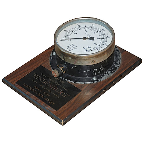 This German-made cockpit gauge was found in the rubble after the tragic 1937 crash of the Airship Hindenburg at Lakehurst Naval Air Station in New Jersey. It is mounted on a plaque with an inscription: From The Hindenburg, May 6, 1937, Lakehurst, New Jersey. Estimate: $1,000-$1,500. Image courtesy Grey Flannel Auctions.