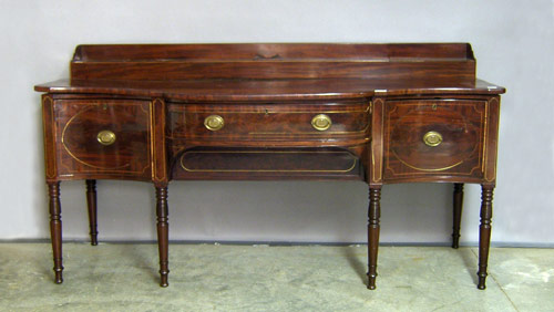 Dating to the early 19th century is this Regency mahogany sideboard, which is 43 1/2 inches tall by 82 inches wide. Image courtesy Pook and Pook Inc.