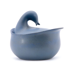 Eva Zeisel designed this casserole with duck head cover for Great Western Stoneware. The dish is 9 by 7½ inches and has a blue and brown microcrystalline glaze. It sold for $2,700 at Sollo-Rago Modern Auction in October 2006. Image courtesy Sollo-Rago Modern Auctions.