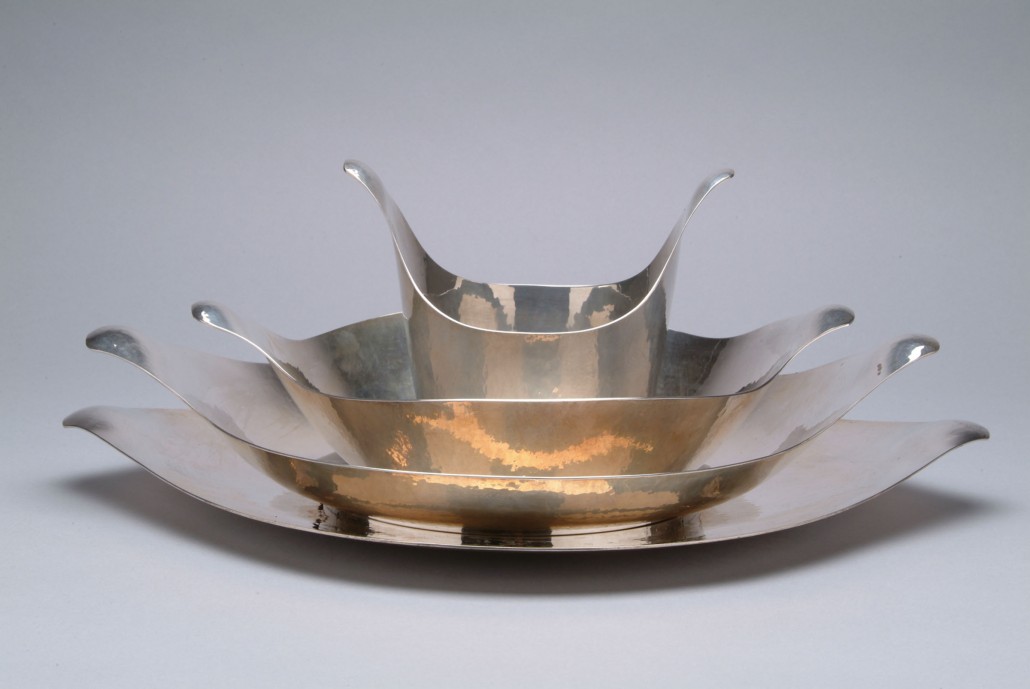 Michael Brophy Zeisel-inspired nesting set, 1999. Eva Zeisel's 1957 Hallcraft Century design inspired Michael Brophy to craft this hammered-sterling-silver nesting set in 1999 for The Orange Chicken LLC. Collection of the Erie Art Museum.