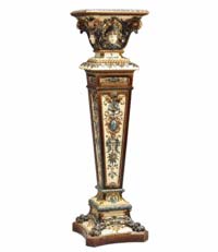Rorstand, a Swedish firm started in 1726, made this 45-inch-tall majolica pedestal with four women's faces and other decorations. It was new in 1893 at the Columbian Exposition in Chicago. James D. Julia Auctions got $4,025 for it this year.