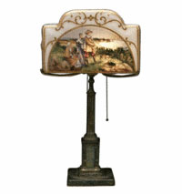 Pilgrims are painted inside the glass shade on this 24 3/4-inch-high Pairpoint lamp. It sold at Brunk Auctions in Asheville, N.C., for $4,140.