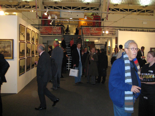 Three views of the busy opening night of the London Art Fair at the Business Design Centre in Islington. Images ACN.
