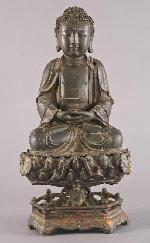 This Chinese Ming Dynasty gilt bronze Buddha brought $8,963. Image courtesy Dallas Auction Gallery and LiveAuctioneers.com Archive.