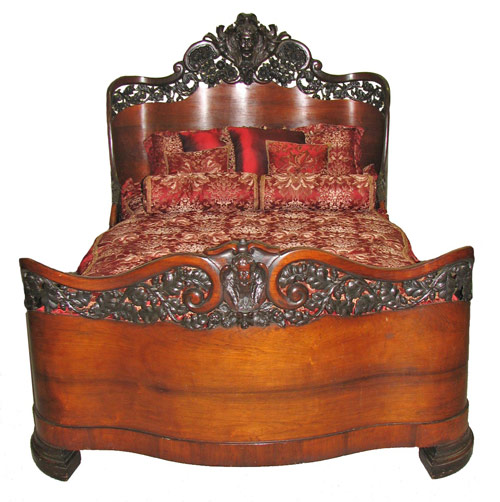 Extremely rare pierce-carved John Henry Belter laminated bed, one of only two known. Image courtesy Hal Hunt Auctions.