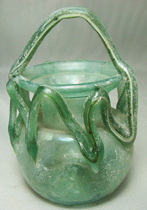 This Roman glass flask from around the second century is expected to sell for $600-$750. Image courtesy of Malter Galleries Inc.