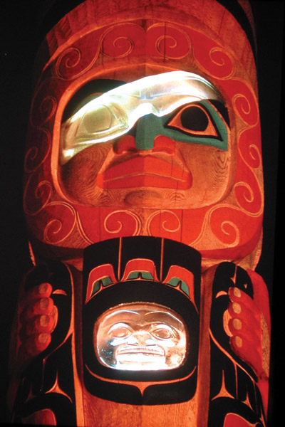 David Svenson worked with Preston Singletary, a fellow glass artist of Tlingit descent, and the carvers at Alaska Indian Arts on the Pilchuck Founders Totem, a 2001 work of carved wood and cast glass illuminated by neon. The work honors the founders of the Pilchuck Glass School near Seattle, where it stands. Image courtesy David Svenson.