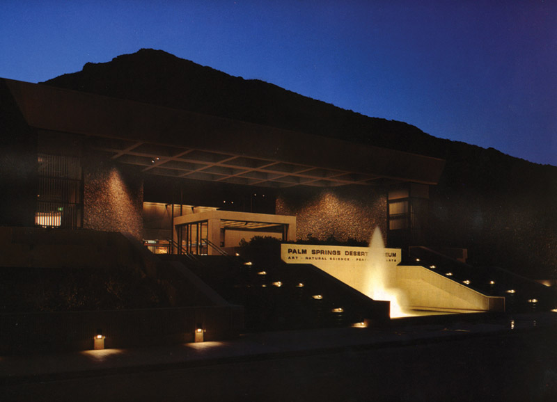 E. Stewart Williams designed the iconic Palm Springs Art Museum in harmony with the mountain behind it. An illuminated fountain adds to the drama of the museum at night. Photo courtesy of the Palm Springs Art Museum.