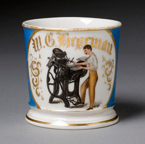 Letterpress printing, as depicted on this antique occupational shaving mug, is making a comeback. Image courtesy of Cowan's Auctions and LiveAuctioneers.com archive.