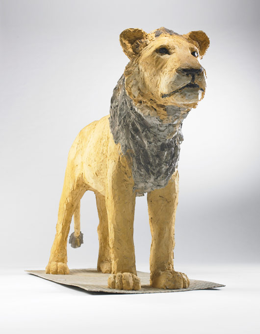 Stephen Balkenhol's untitled sculpture of a lion stands more than 7 feet long. Image courtesy Wright.