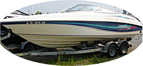 1995 Rinker Capri motor boat with inboard/outboard Mercruiser engine, trailer and wench. Low hours. Image courtesy Tom's Auctions & Appraisals.