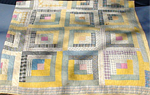 Log cabin quilt made around 1900 by a ancestor of the consignor, measuring about 72 inches by 54 inches. Image courtesy Tom's Auctions & Appraisals.