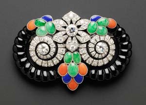 Art Deco diamond, onyx, jadeite and coral brooch by Boucheron Paris, sold for $189,600. Image courtesy Skinner Inc.