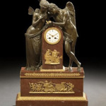 Cupid and Psyche in bronze are paired on this 19th-century French clock having a rouge royale marble base. Standing 30 ½ inches high, it boasts a $10,000-$15,000 estimate. Image courtesy New Orleans Auction Galleries.