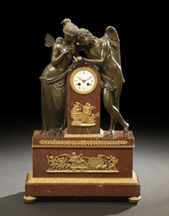 Cupid and Psyche in bronze are paired on this 19th-century French clock having a rouge royale marble base. Standing 30 ½ inches high, it boasts a $10,000-$15,000 estimate. Image courtesy New Orleans Auction Galleries.