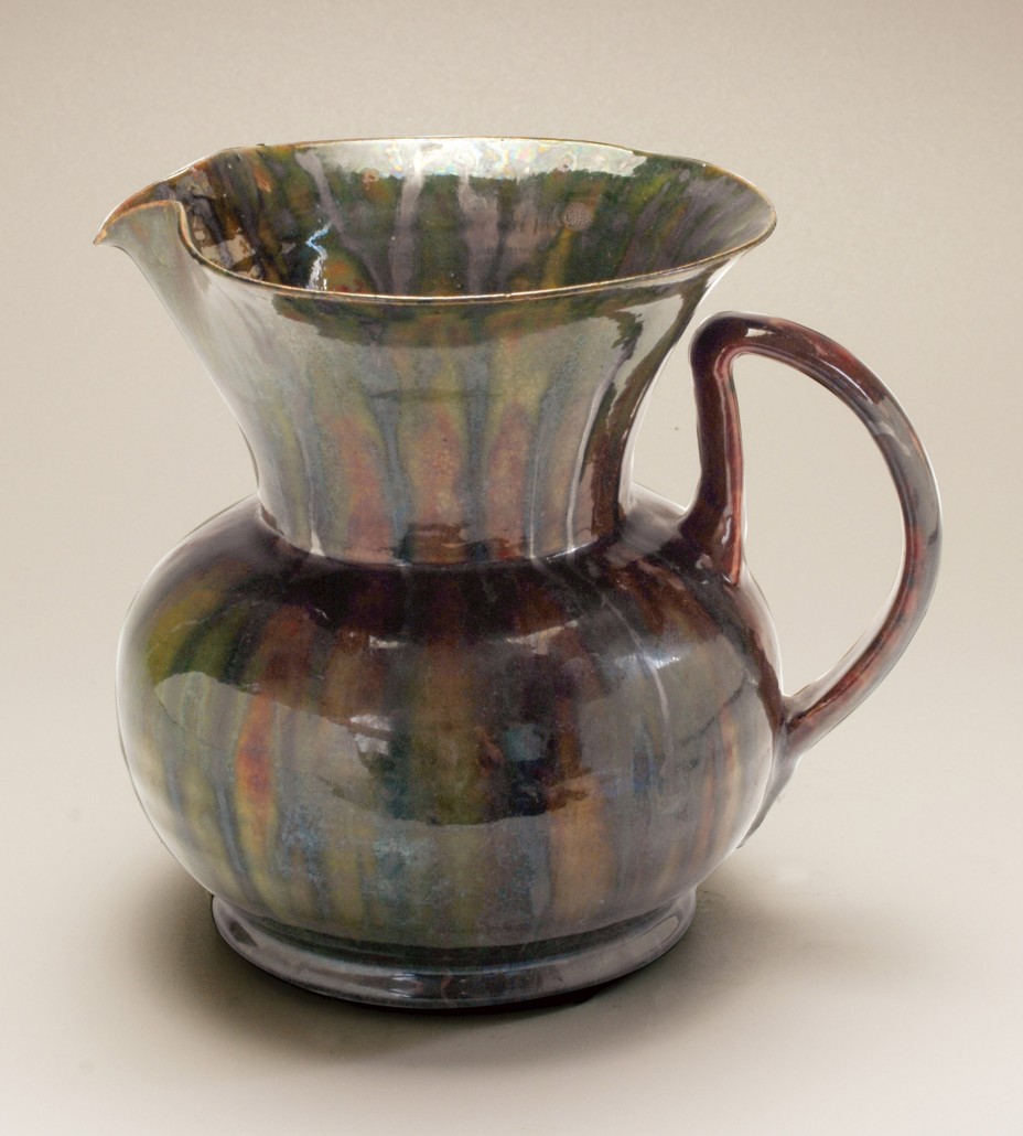 Pitcher, c. 1898, glazed ceramic, 5 1/2in x 5 1/2in. Collection of the Ohr-O’Keefe Museum of Art. Gift of the estate of Hollis C. Thompson Jr., in memory of Evelyn Desporte Thompson, Nickie O'Keefe, Tine Lancaster and Annette O’Keefe.