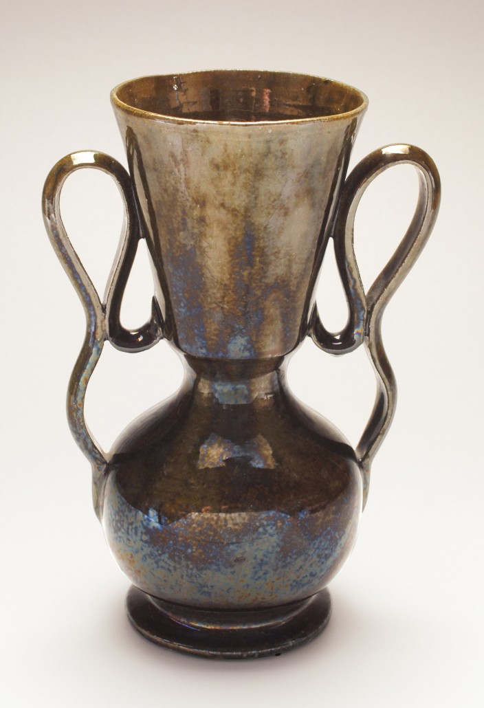 Double-handled vase, c. 1898, glazed ceramic, 7 3/4in x 5 1/4in. Collection of the Ohr-O’Keefe Museum of Art. Gift of the estate of Hollis C. Thompson Jr., in memory of Evelyn Desporte Thompson, Nickie O'Keefe, Tine Lancaster and Annette O’Keefe.