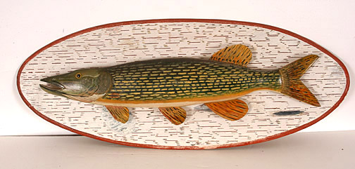 Carved and painted wood depiction of a pike fish, by Phillippe Sirois, titled Pike ($2,070). Image courtesy Slotin Auction.