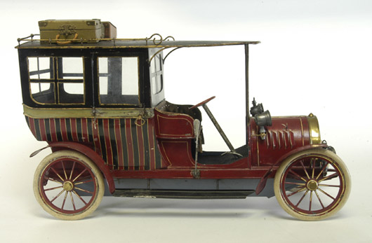 Believed to be the largest manufactured tin toy limousine ever made, this circa-1907 was long thought to be a French production, but subsequent research by David Pressland, author of The Great Book of Tin Toys, revealed it was made by Hispania of Barcelona, Spain. Exquisite artistry and craftsmanship are obvious throughout the 22½-inch-long toy, which sold at Bertoia's for $80,500. Image courtesy Bertoia Auctions.