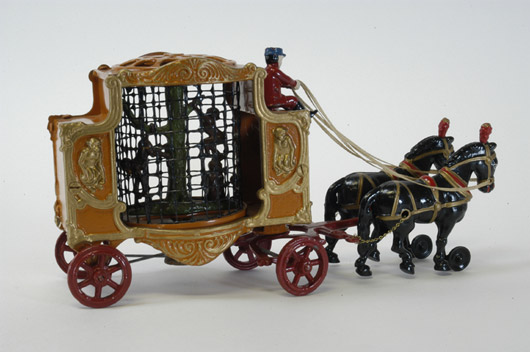 Considered the most elusive piece within Hubley's famed Royal Circus cast-iron menagerie on wheels, the circa-1920s Monkey Wagon cage includes a mesh wire cage that actually revolves as the toy is pulled along. This 16-inch-long factory showroom sample was formerly part of the Perelman Museum Collection. It sold at Bertoia's for $97,750, more than twice the high estimate. Image courtesy Bertoia Auctions.