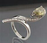 This graceful 14-karat white gold ring sports a 1 1/2-carat light brown diamond. Image courtesy Seven Diamonds.