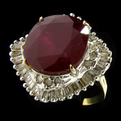 This ruby and diamond ring has a total carat weight of 12.98 carats. It is set in 14-karat gold. Image courtesy GovernmentAuction.com.