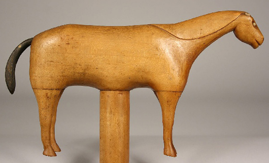 From East Tennessee comes an unusual folk art walking cane with a carved horse handle. It has an $800-$1,000 estimate. Image courtesy Case Antiques Auction.