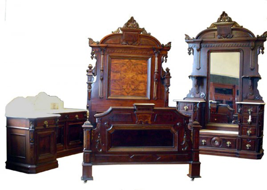 Victorian furniture doesn't get any higher than this American Renaissance Revival four-piece bedroom set. Image courtesy Bob Courtney Auctions.