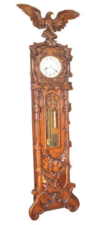 The Black Forest grandfather clock is 99 inches high and dates to the 1880s. Image courtesy Bob Courtney Auctions.