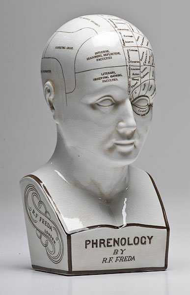 Molded of white earthenware, this Phrenology head was made in England in the second half of the 19th century. It stands about 11 3/8 inches high. Image courtesy Cowan's Auctions.