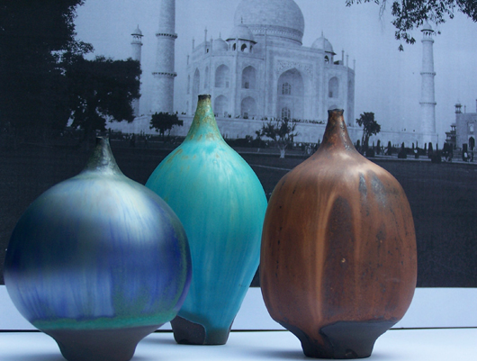 This group of three vases displays the subtle variations in curvature on Cabat's feelies. The golden-brown example at right shows off the potter's onionskin glaze. Courtesy Bruce Block.