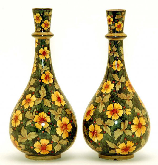 Pair of John Bennett art pottery vases, 9 inches tall. Estimate $6,000-$8,000. Image courtesy LiveAuctioneers/Cordier Antiques & Auctions.