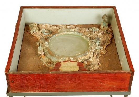 Porthole from the Battleship U.S.S. Maine, whose sinking on Feb. 15, 1898 sparked the Spanish-American War. Collection of the late Raymond A. Farr. Estimate $3,000-$5,000. Image courtesy LiveAuctioneers/Cordier Antiques & Auctions. 